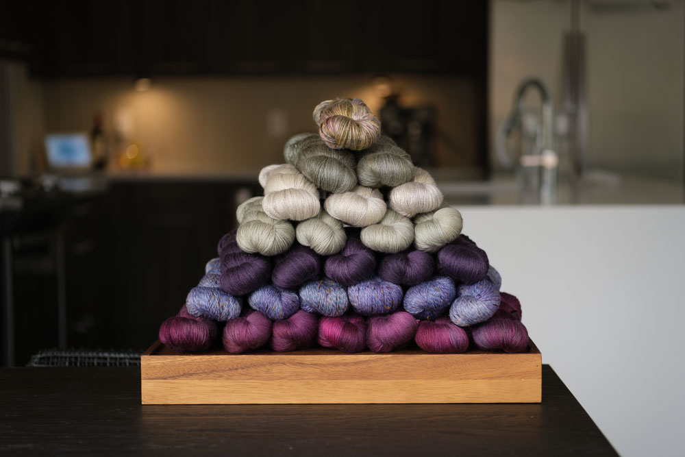 A colorful pyramid of yarn skeins